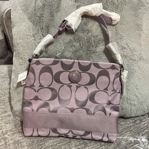 Brand new with tags, never used Coach file bag—light purple